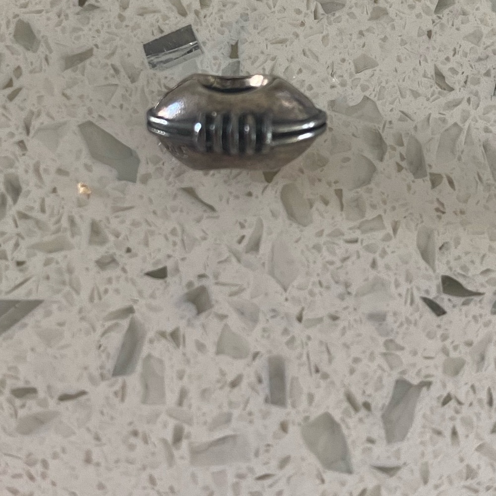 Pandora football charm needs polished